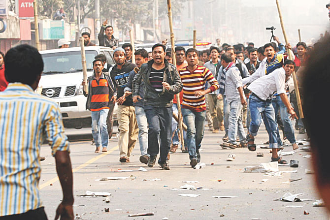 Stick-wielding Chhatra Dal activists, escort Khaleda's motorcade as it heads towards the court. Photo: Star