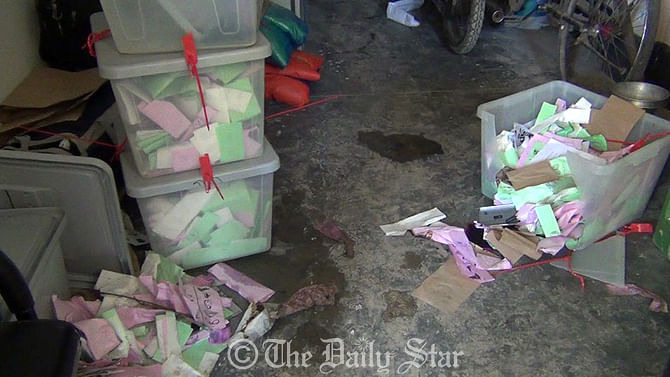 Police recover vandalised ballot boxes from a village after Jamaat-Shibir activists looted three ballot boxes and set fire to another one at Hazrakati Primary School polling centre in Monirampur of Jessore. Photo: Star
