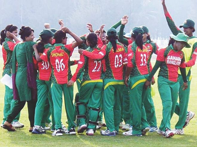 Members of the Bangladesh women cricket team celebrate after beating Pakistan in their first one-day international at the Sheikh Kamal International Cricket Stadium in Cox's Bazar yesterday. PHOTO: star