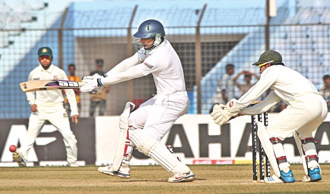 Sri Lanka batsman Kumar Sangakkara plays a square-cut during the first day of the second Test against Bangladesh at the Zahur Ahmed Chowdhury Stadium in Chittagong yesterday. The left-hander remained unbeaten on 160 as the visitors posted 314 for 5 at stumps. PHOTO: ANURUP KANTI DAS