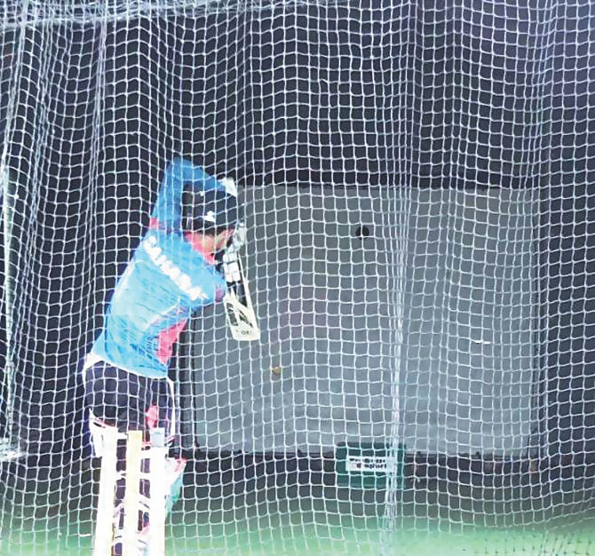 Batsman Nasir Hossain uses a batting simulator while practising in the nets during the Tigers' camp at Brisbane yesterday. Using the device was a comparatively new experience for the Bangladeshi cricketers. Photo: BCB  