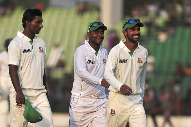 BCB XI players are all smiles after bundling out Zimbabwe for just 241 on the first day of the three-day practice match at the Fatullah Stadium yesterday.   PHOTO: STAR 