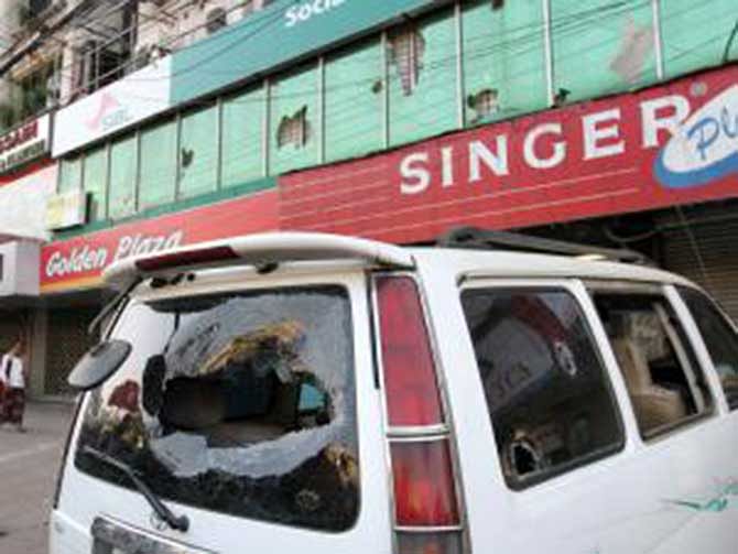 A vandalised microbus stand still after two factions of Bangadesh Chhatra League clashed in Chittagong today. Photo: Prothom Alo