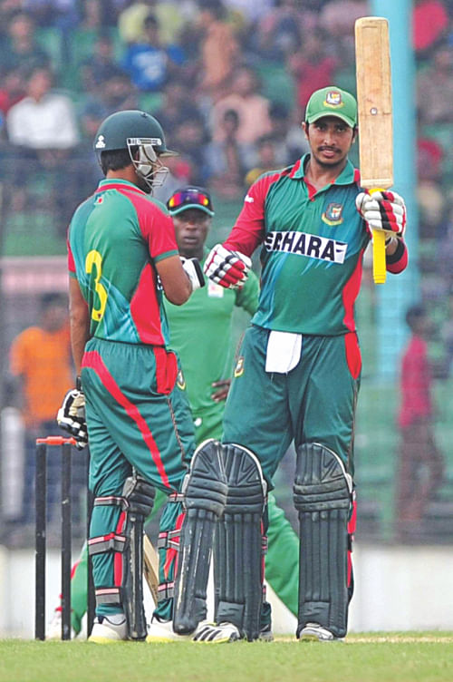  Opener Soumya Sarkar raises his bat after reaching his half-century at the Fatullah Cricket Stadium yesterday. His 83-ball 86 led Bangladesh A to a six-wicket win over Zimbabwe A.  PHOTO: STAR 