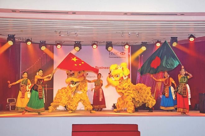 Artists perform at a colourful cultural programme after a seminar on Bangladesh-China business outlook, organised by HSBC and the Chinese Chamber of Commerce in Bangladesh, at Radisson Hotel in Dhaka on Friday.  Photo: HSBC