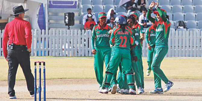A BPJA file photo shows Bangladesh women cricketers are ecstatic after sending a Nepali batter back to the pavilion yesterday