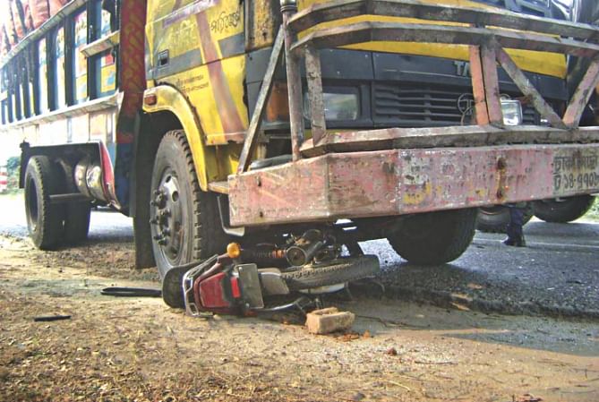 Motorbike of the BGB jawans crushed under the truck. Photo: Star
