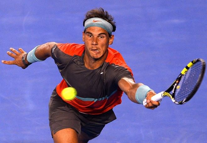 World number one Rafael Nadal of Spain plays a forehand against Thanasi Kokkinakis of Australia during their Australian Open men's singles match in Melbourne yesterday. Photo: AFP