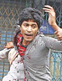 Bishwajit as he tries to escape his murderers on December 9, 2012.