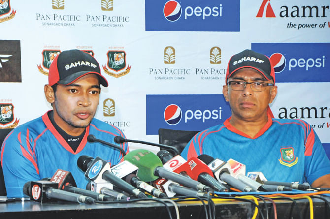 Bangladesh captain Mushfiqur Rahim (L) briefs the media on their four-week camp for the upcoming tour of the West Indies as coach Chandika Hathurusingha listens in Mirpur on Sunday. PHOTO: STAR