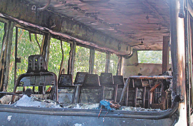 The charred frame of a bus set on fire in Kulaura upazila, Moulvibazar. Photo: Star, Banglar Chokh