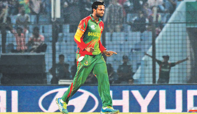 Star Bangladesh all-rounder Shakib Al Hasan celebrates one of his three wickets in their World Twenty20 Group A match against Hong Kong at the Zohur Ahmed Chowdhury Stadium in Chittagong yesterday. Shakib saved the tournament for Bangladesh as he slowed down Hong Kong's progress which saw them fail to chase the total within 13.1 overs, which would have seen the Tigers exit the tournament. PHOTO: ANURUP KANTI DAS
