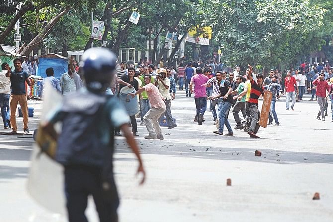 Activists of BNP and its front and affiliated organisations clashing with police yesterday, after being obstructed from entering the premises of the makeshift Special Judge's Court-3 at Government Alia Madrasa in Bakshibazar of the capital on the heels of party Chairperson Khaleda Zia, where she was scheduled to appear in connection with Zia Charitable Trust, and Zia Orphanage Trust graft cases filed against her and eight others. The law enforcers claimed that they resorted to ‘light baton charge in order to ensure Khaleda's security’, ensuing the clash that lasted almost 35 minutes, leaving at least 10 including three policemen injured, and two cars vandalised. Photo: Palash Khan