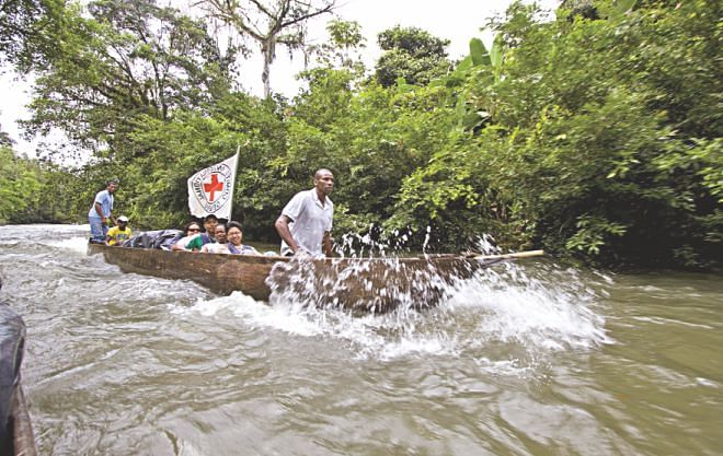 ICRC doctors and nurses go by boat on the Espi River: Colombia, 2010. 