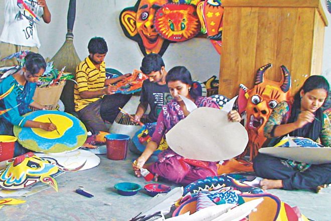 Artists at work to usher in Boishakh.