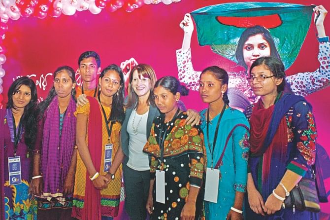Lynne Featherstone with teenagers from different parts of the country who made their mark in fighting early marriage.   Photo: Star