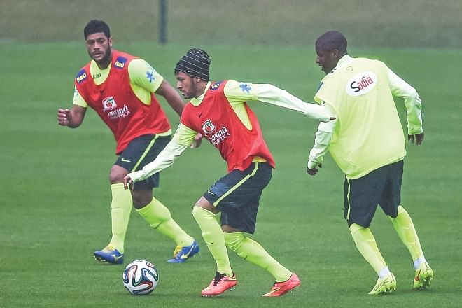 The weight of expectation will be on Neymar (C) when hosts Brazil kick off the FIFA World Cup 2014 against Croatia in Sao Paulo today. PHOTO: GETTY IMAGES
