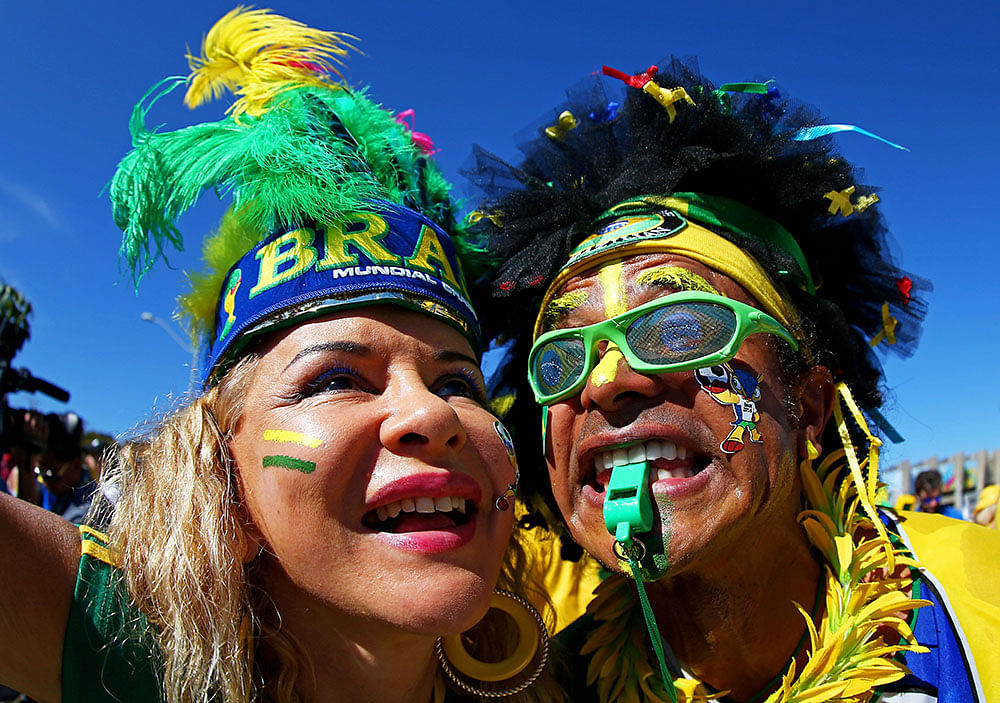 Brazil fans enjoy the atmosphere prior to kickoff during the 2014 FIFA World Cup Brazil round of 16 match between Brazil and Chile. Photo: Getty Images