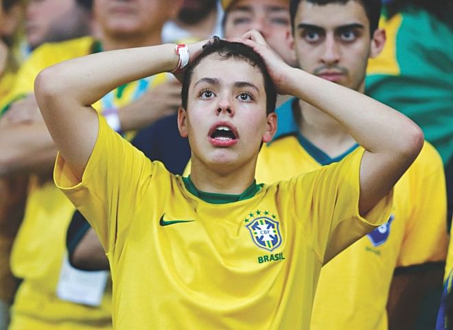 Going 7-1 down to Germany, it was all about disbelief for Brazil fans. PHOTO: REUTERS