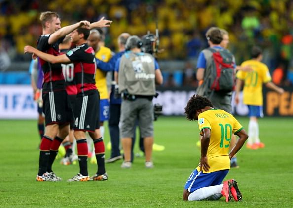 Willian of Brazil reacts after the 1-7 defeat in the 2014 FIFA World Cup Brazil Semi Final match between Brazil and Germany at Estadio Mineirao on July 8, 2014 in Belo Horizonte, Brazil. Photo: Getty Images