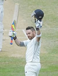 New Zealand captain Brendon McCullum salutes the Basin Reserve crowd at Wellington after completing his triple hundred, the first by a New Zealand batsman, against India on the fifth and final day of the second Test yesterday. Photo: AFP