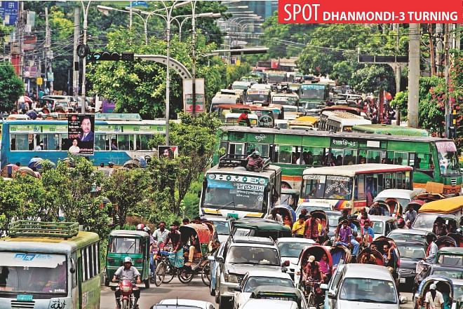 Buses from Jhigatola take turn en route to Elephant Road, creating traffic chaos at Dhanmondi-3 turning in the capital around 2:00pm yesterday.  Photo: Anisur Rahman