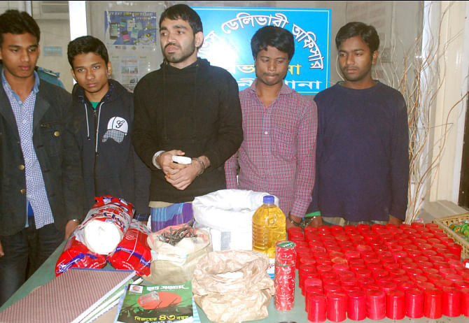 Police yesterday bust a bomb-making factory at Mohakhali in the capital and recover 130 homemade explosives and other bomb-making materials. They also arrested five Islami Chhatra Shibir men in this connection.  Photo: Banglar Chokh