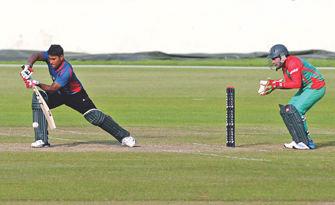 In and out Bangladesh opener Imrul Kayes plays a forward defensive shot during a practice game in Mirpur yesterday. He struck a compact half century. Photo Star