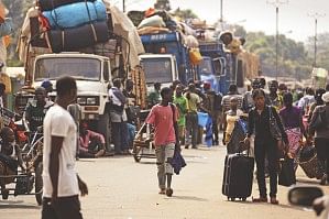 Muslim civilians prepare to board trucks in the P12 district of Bangui to flee the Central African Republic capital yesterday.  Photo: AFP