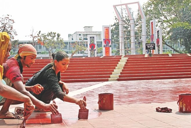 The premises of Central Shaheed Minar in the capital being painted to give it a facelift ahead of International Mother Language Day to be observed on Friday. Photo: Star