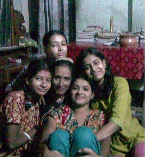 HAPPY OCCASION NOW SAD MEMORY: The picture of Chanpa Rani Bhowmik (centre) with her four daughters at their house in Modhukhali upazila under Faridpur district. The woman was killed by a stalker of her daughters for protesting the evil act on October 26 in 2010.  FILE PHOTO: STAR