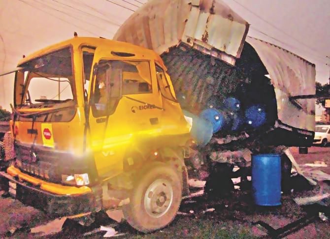A barrel full of chemical exploded inside this lorry at Kadamtoli of the capital, ripping the vehicle apart and killing its driver yesterday. Photo: Banglar Chokh