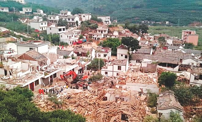 A general view shows collapsed houses after an earthquake hit a remote mountainous area of Yunnan province in southwest China yesterday. Photo: Reuters/AFP