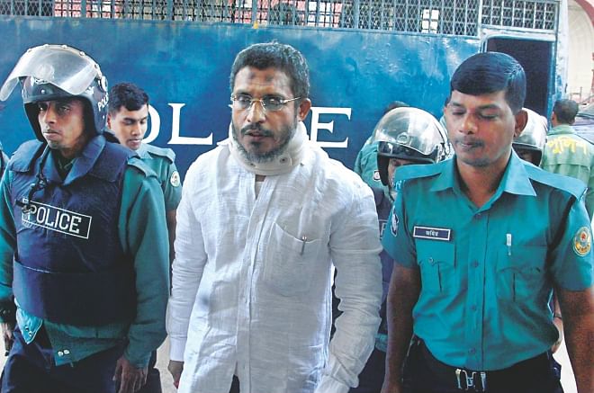 Former home minister Lutfozzaman Babar, an accused in the 10-truck arms haul cases, is being taken to a Chittagong court yesterday.  Photo: Star