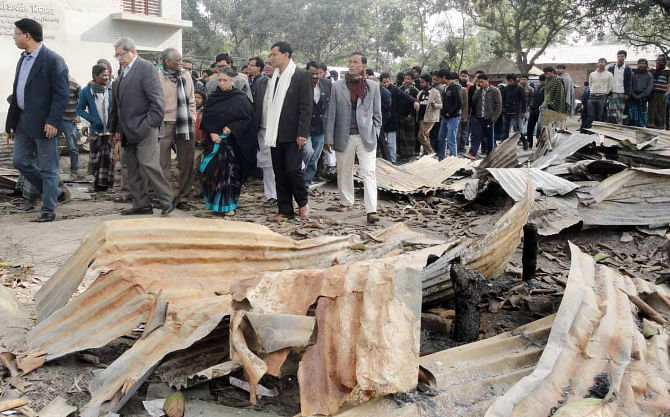 Civil society members including human rights activists and academics visited Kornai village in Dinajpur Sadar upazila a couple of days after the local Hindus and their belongings faced the wrath of Jamaat-Shibir men centring the parliamentary election on January 5 last year. FILE PHOTO: STAR