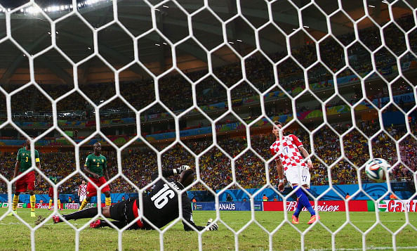 Mario Mandzukic of Croatia scores his team's fourth goal, his second, past Charles Itandje of Cameroon during the 2014 FIFA World Cup Brazil Group A match between Cameroon and Croatia at Arena Amazonia on June 19, 2014 in Manaus, Brazil. Photo: Getty Images