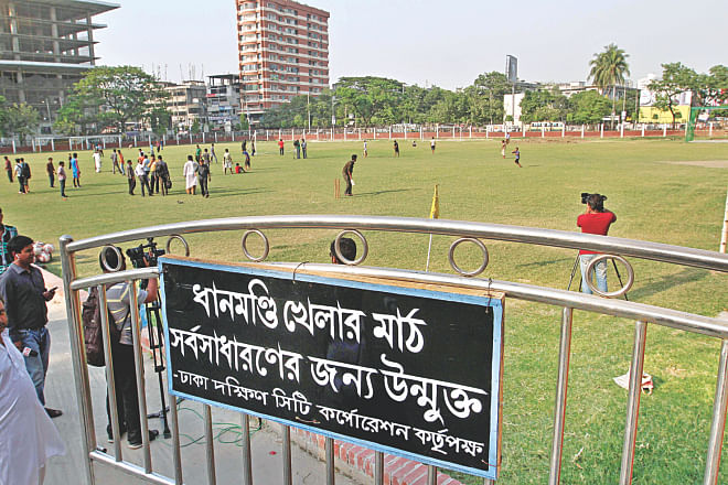 Dhaka South City Corporation hung a notice on the gate, opening the ground to all after two years.  Photo: Anisur Rahman