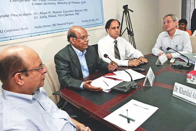 Analysts attend a discussion on budget organised by the Policy Research Institute in association with DFID in Dhaka yesterday. Photo: Star