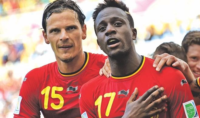 Teenage striker Divock Origi (R) came off the bench to shoot Belgium to the last 16 with an 88th minute winner against Russia at the Maracana Stadium in Rio de Janeiro yesterday. Photo:  AFP