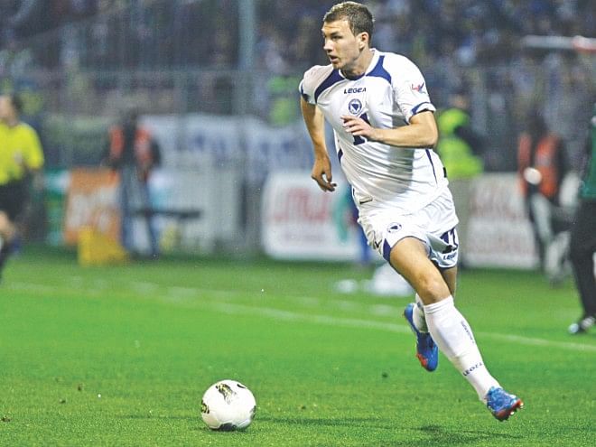 Edin Dzeko: The Bosnian talisman is set to face his Manchester City teammate Sergio Kun Aguero in their group clash. 