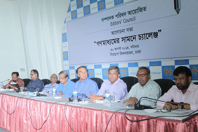 From right, Shyamal Dutta, Shykh Seraj, Shawkat Mahmud, Mahfuz Anam, Golam Sarwar, Prof Serajul Islam Choudhury, Monjurul Ahsan Bulbul, and Barrister Amir-ul Islam at a discussion, 