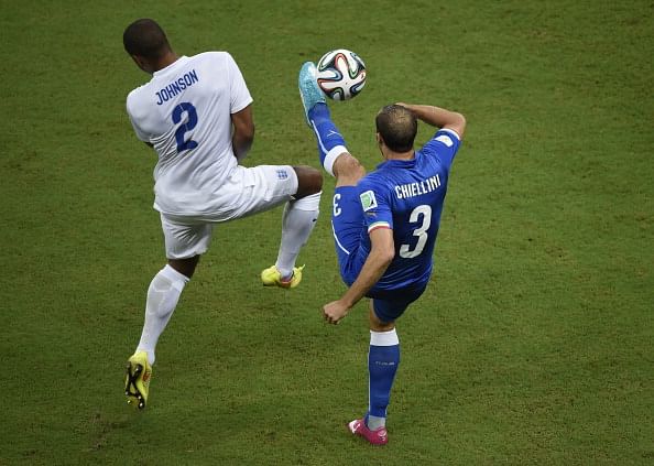 Italy's defender Giorgio Chiellini (R) and Italy's defender Mattia De Sciglio vie for the ball during a Group D football match between England and Italy at the Amazonia Arena in Manaus during the 2014 FIFA World Cup on June 14, 2014. Photo: AFP/Getty Images
