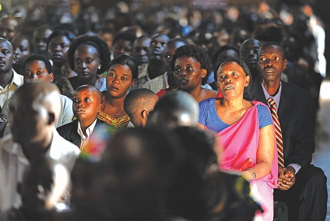 People pray inside an Evangelical restoration church in Kigali yesterday, on the eve of the start of a national mourning period marking the 20th anniversary of the 1994 genocide against the Tutsi in Rwanda.  Photo: AFP