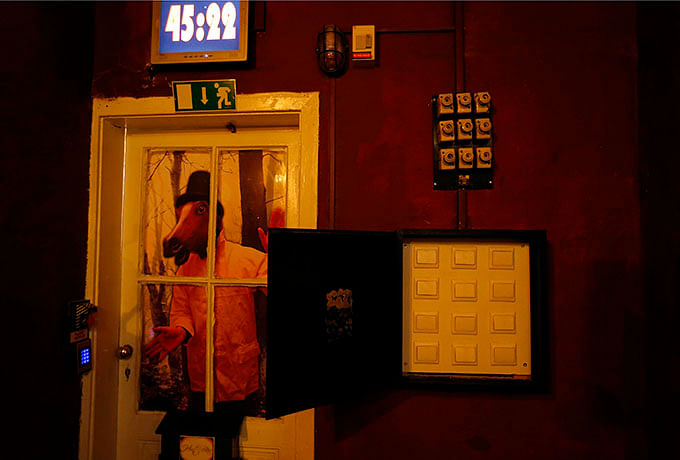 A clock, clues and locks are seen in an escape room at ExitPointGames in Budapest August 1, 2014. Photo: Reuters 