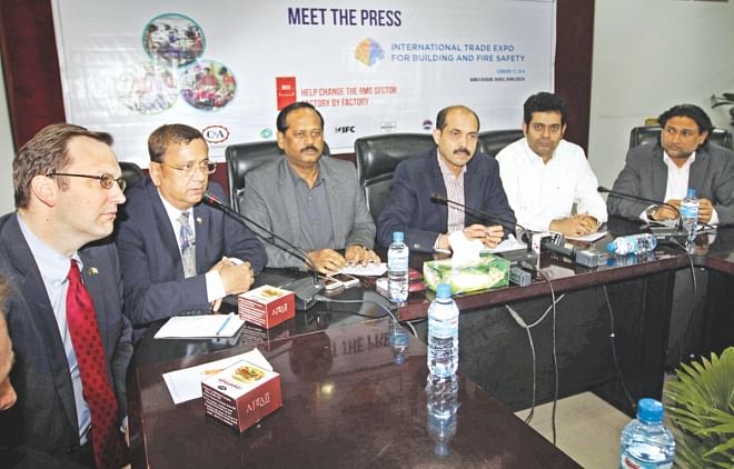 Third from right, Atiqul Islam, BGMEA president, attends a press conference yesterday to announce a factory safety exposition in Dhaka. Photo: Star