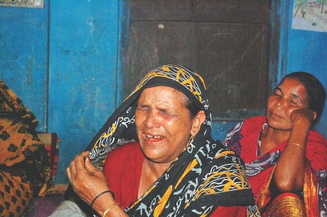 Family members grieving for Alauddin Mollik, 34, of Pabna as the two men along with Faruk Khan, 38, of Munshiganj were killed Monday in a construction site collapse in Malaysia where they went in hope of bettering their lives. Photo: Star
