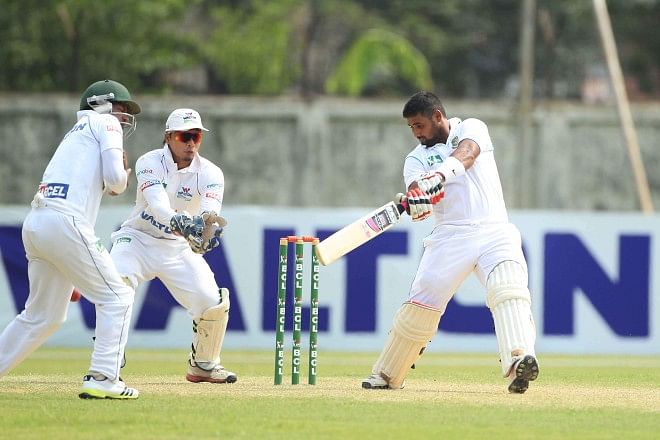 North Zone batsman Forhad Hossain cuts the ball late during his 109 against reigning Bangladesh Cricket League champions Central Zone at the BKSP yesterday. Forhad's century took his side to a strong 287 for 4. Photo: Star