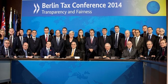 Finance ministers and tax chiefs from 50 countries pose for a family picture in Berlin on Wednesday. Photo: REUTERS 