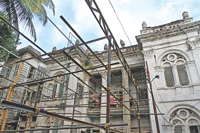 Scaffoldings are in place for building a garage for fire engines in front of the century-old mansion in Sutrapur of Old Dhaka. The photo was taken yesterday. Photo: Palash Khan