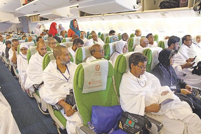 Pilgrims in the first Hajj flight at Hazrat Shahjalal International Airport of the capital yesterday. A Boeing 777-300ER  of Biman Bangladesh Airlines took off with 409 pilgrims on schedule, at 7:05am. The Hajj flight operations will continue till September 28. Photo: Star